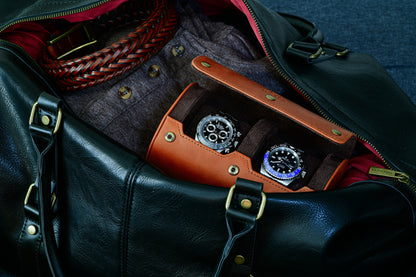 Tawny Brown full-grain leather 2 watch roll inside a travel bag protecting luxury watches during business trips.
