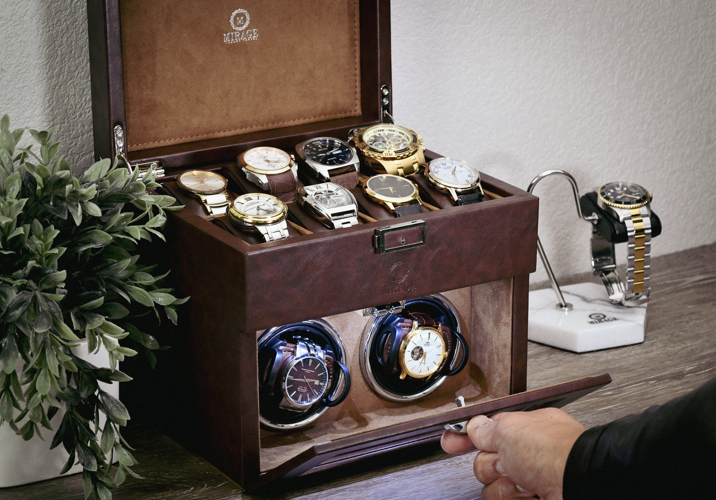 Mirage Luxury Travel Coffee Brown luxury watch winder with premium vegan leather, premium suede-lined interior, and LED lighting displayed in an elegant home setting.