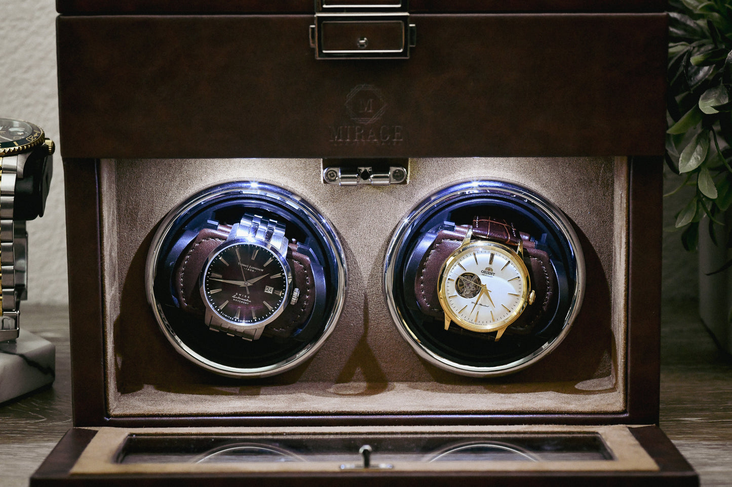 Close-up of the dual winding compartments inside the Mirage Luxury Travel Coffee Brown luxury watch winder with adjustable watch pillows and premium suede lining.
