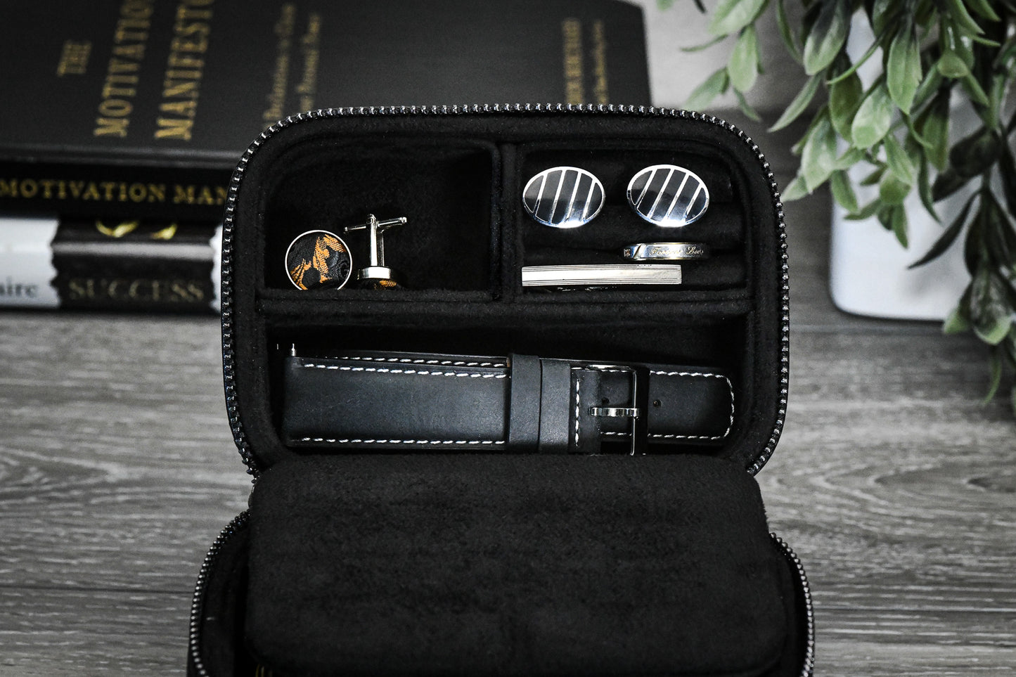 Obsedian Black genuine leather watch and jewelry travel case displayed open with luxury watches, highlighting elegant organization and premium protection.