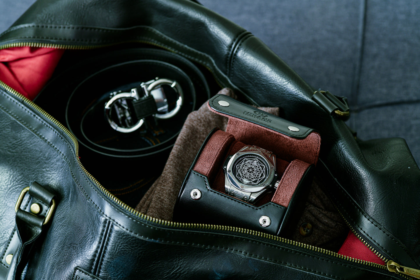 Mirage Luxury Travel Signature Collection Jade Black premium vegan leather 1-watch roll securely stored inside luggage, providing elegant travel protection for luxury watches.