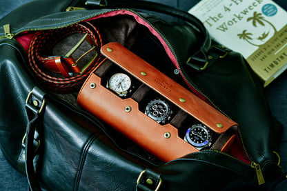 Tawny Brown full-grain leather 3 watch roll displaying three luxury watches for elegant home storage and display.