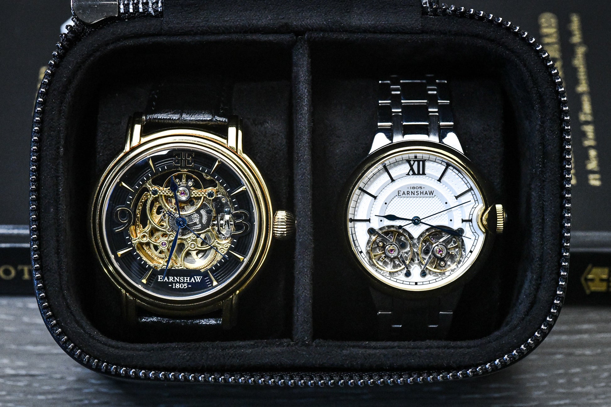Premium suede-lined interior of the Obsedian Black genuine leather watch and jewelry travel case securely holding two luxury watches.