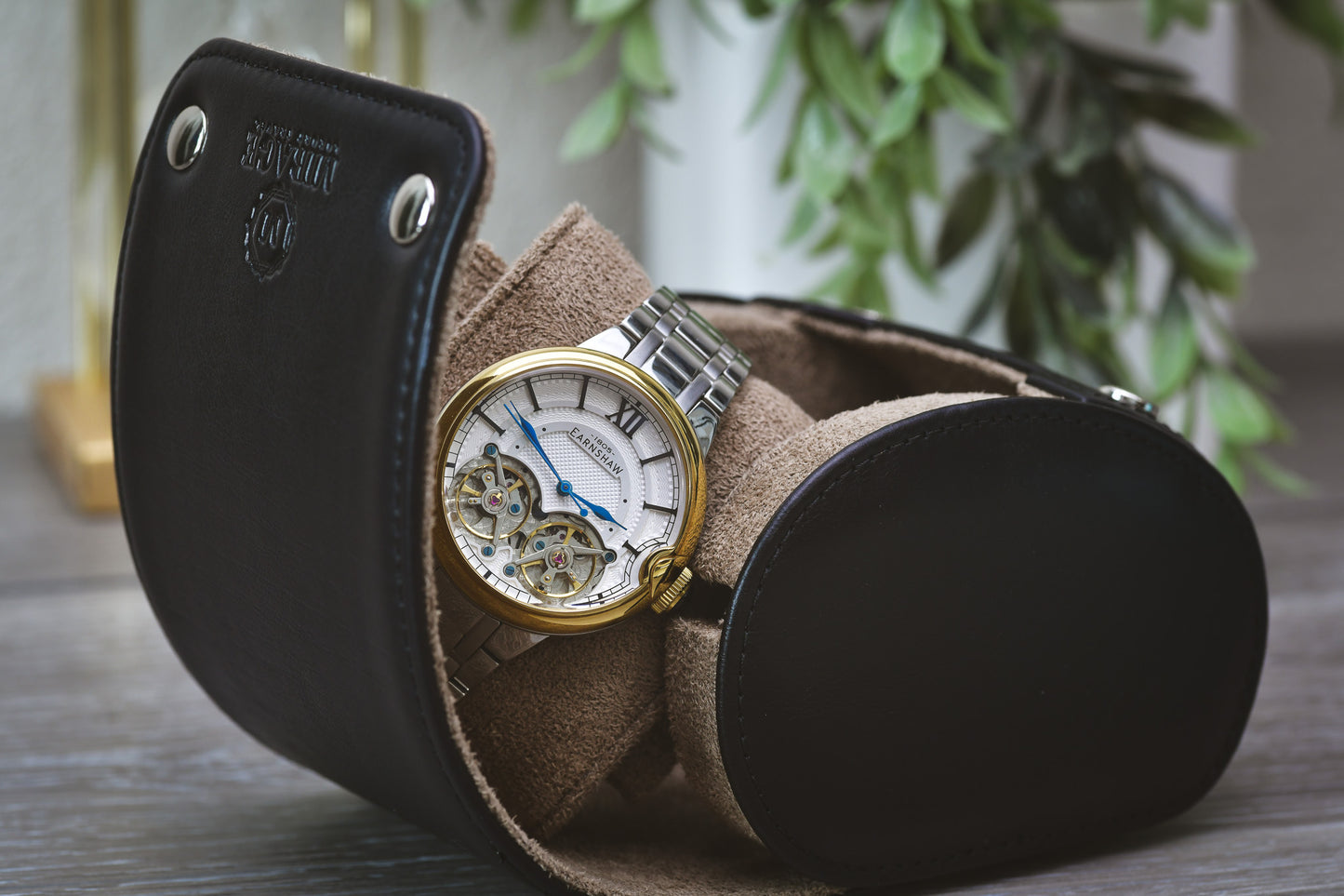 Sable Black full-grain cow leather 1 watch roll displayed open with a luxury watch, highlighting premium watch storage and travel protection.