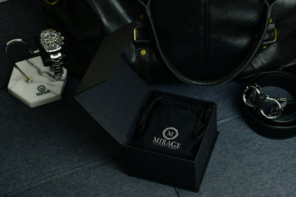Sable Black full-grain cow leather 1 watch roll displayed on a luxury nightstand, highlighting premium craftsmanship and executive watch storage.