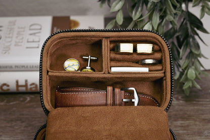 Coffee Brown genuine leather watch and jewelry travel case displayed open with luxury watches and jewelry in an elegant home setting.
