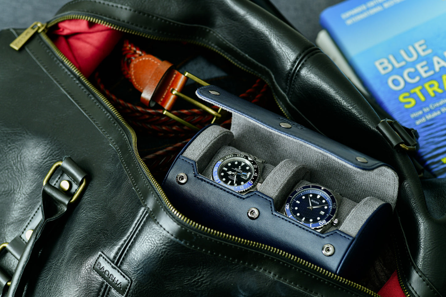Midnight Blue vegan leather 2 watch travel case stored inside a leather duffel bag for business travel and luxury watch protection.