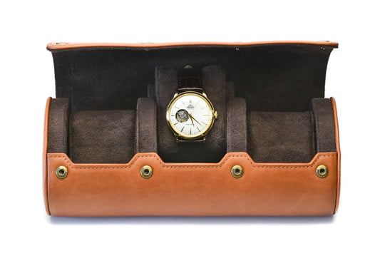 Close-up of the Mirage Luxury Travel logo embossed on Tawny Brown full-grain cow leather, showcasing premium craftsmanship and luxury detailing.