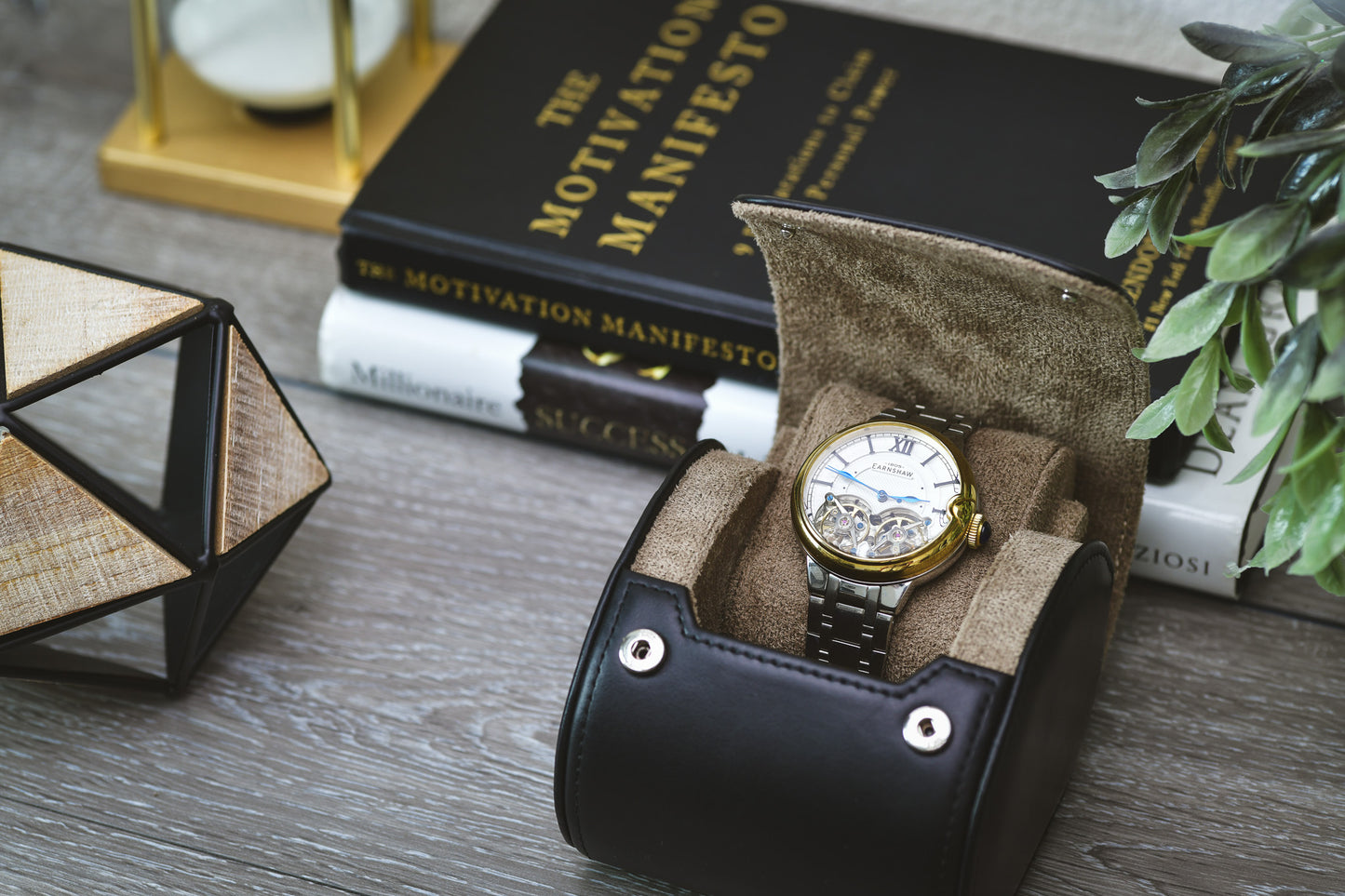 Open Sable Black full-grain cow leather 1 watch roll displaying a luxury watch with plush suede interior in an elegant lifestyle setting.