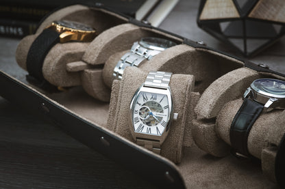 Luxury watch organizer with plush suede interior designed for Rolex, Omega, Tudor, Cartier, and Grand Seiko watches.