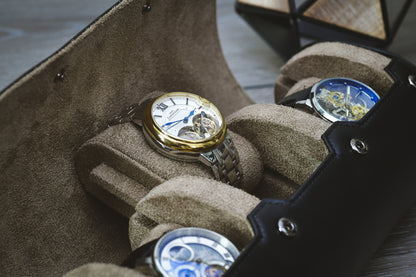 Close-up of the plush suede interior and sliding cushions protecting luxury watches inside the Mirage watch roll.