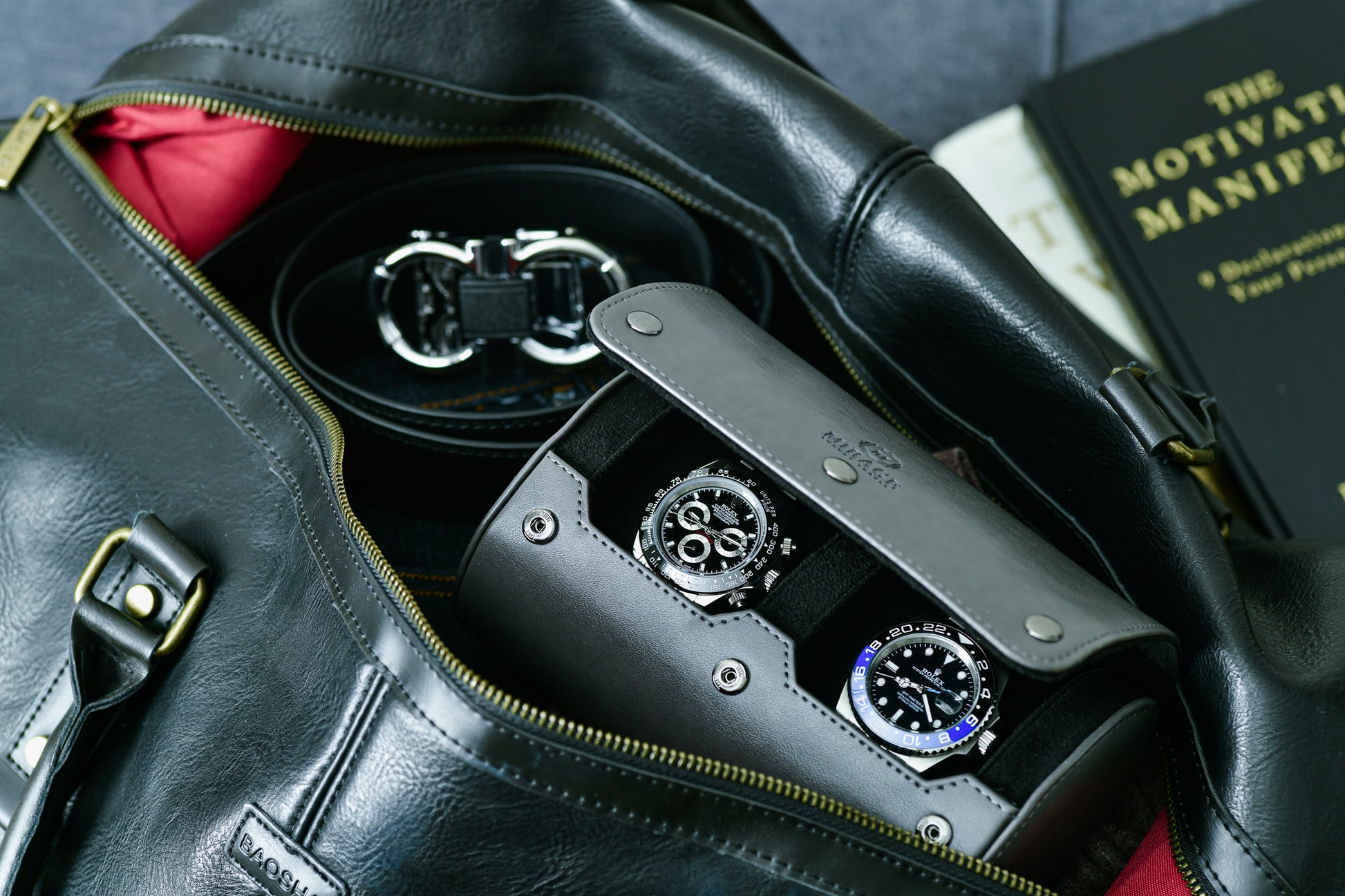 Slate Gray vegan leather 2 watch travel case stored inside a leather duffel bag for business travel and secure luxury watch protection.