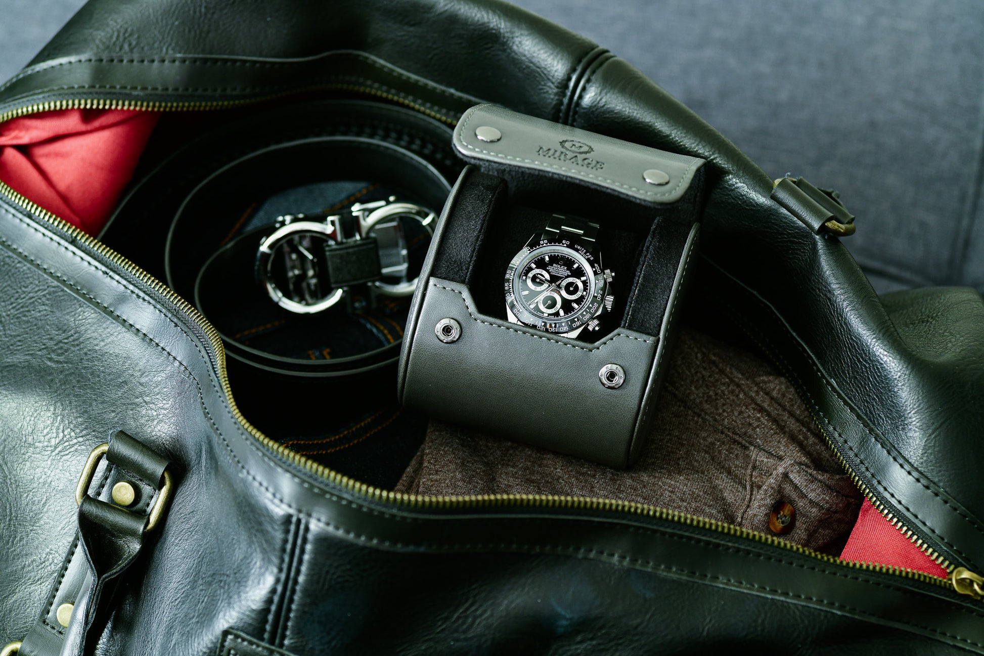 Slate Gray vegan leather 1 watch roll stored inside a travel bag for secure protection while traveling.
