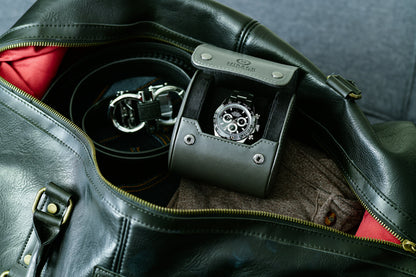 Slate Gray vegan leather 1 watch roll stored inside a travel bag for secure protection while traveling.