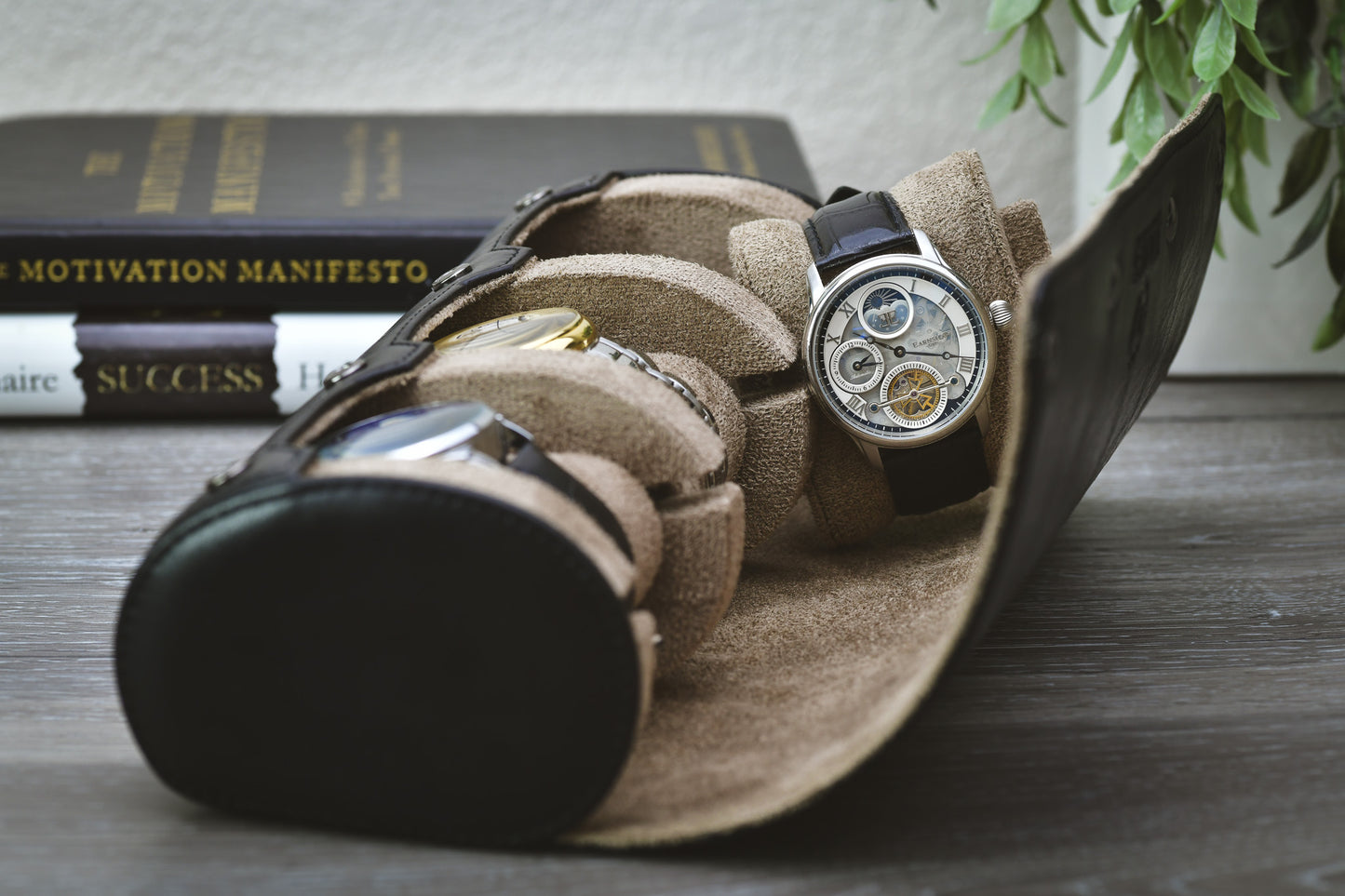 Side profile showing the signature sliding watch cushions inside the Mirage luxury watch roll.