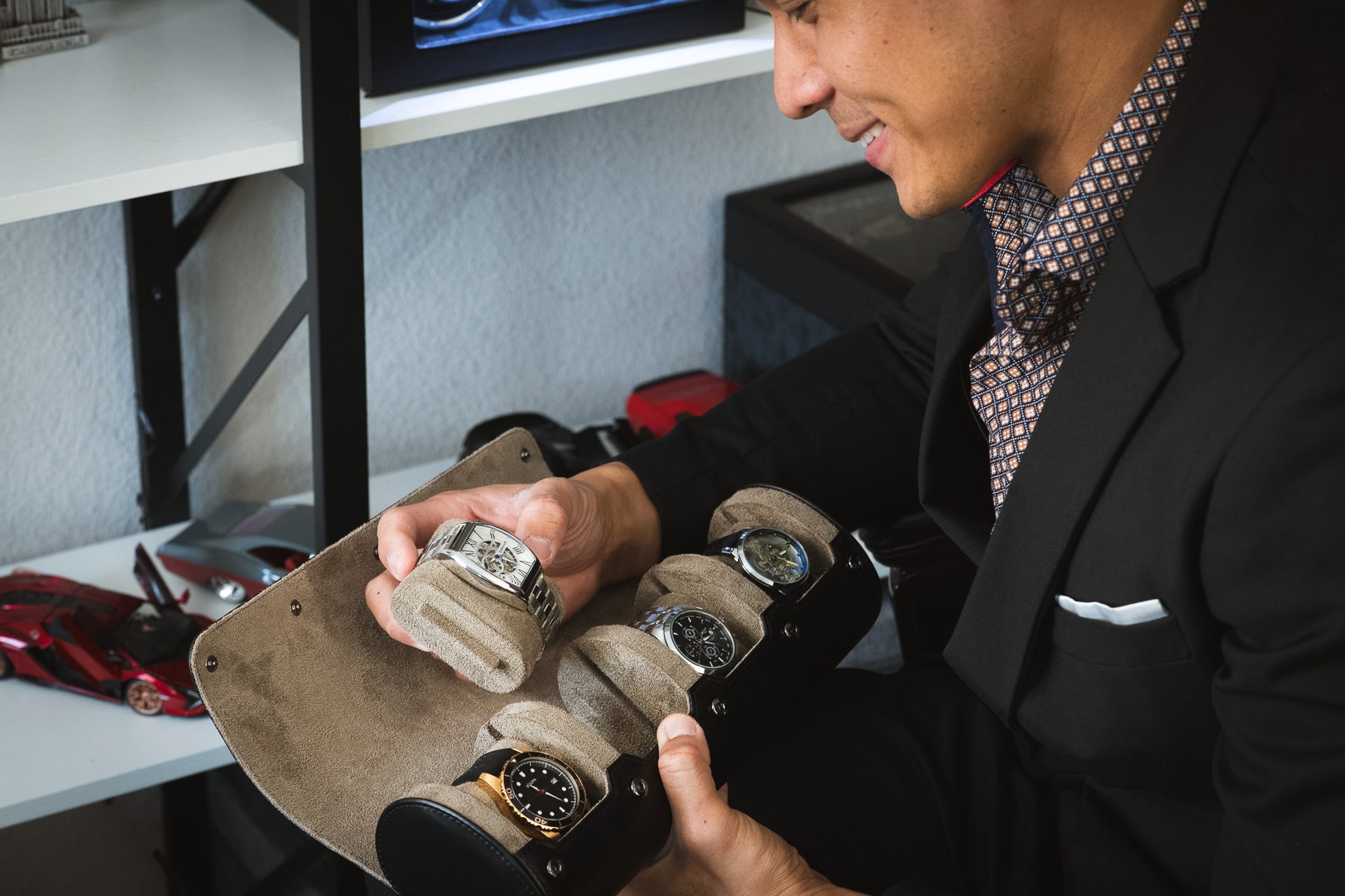 Sliding suede watch cushions designed to protect luxury watches from scratches during travel and storage.