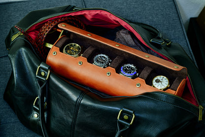Luxury 4 watch roll travel case stored inside a travel duffel bag for secure transportation.