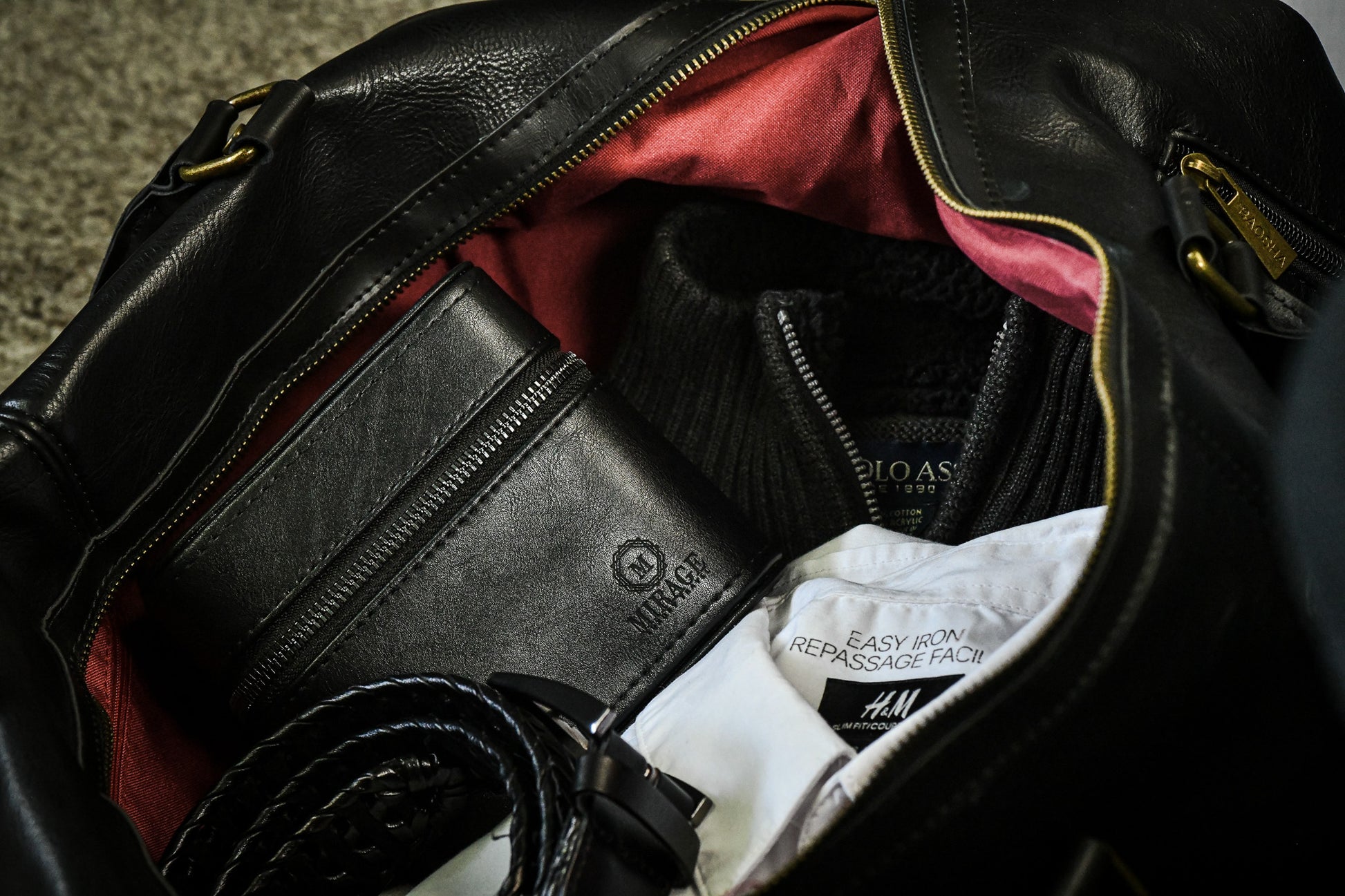 Obsedian Black genuine leather watch and jewelry travel case packed inside a travel bag for secure luxury watch and jewelry protection.
