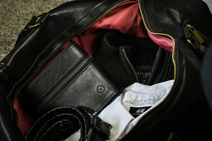 Obsedian Black genuine leather watch and jewelry travel case packed inside a travel bag for secure luxury watch and jewelry protection.