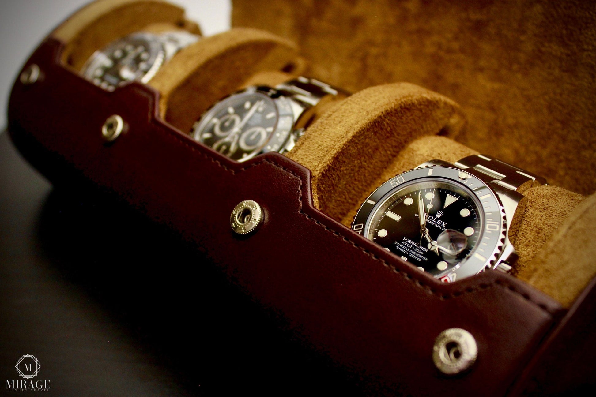 Luxury watches displayed inside Espresso Brown vegan leather watch roll with soft suede interior for collectors