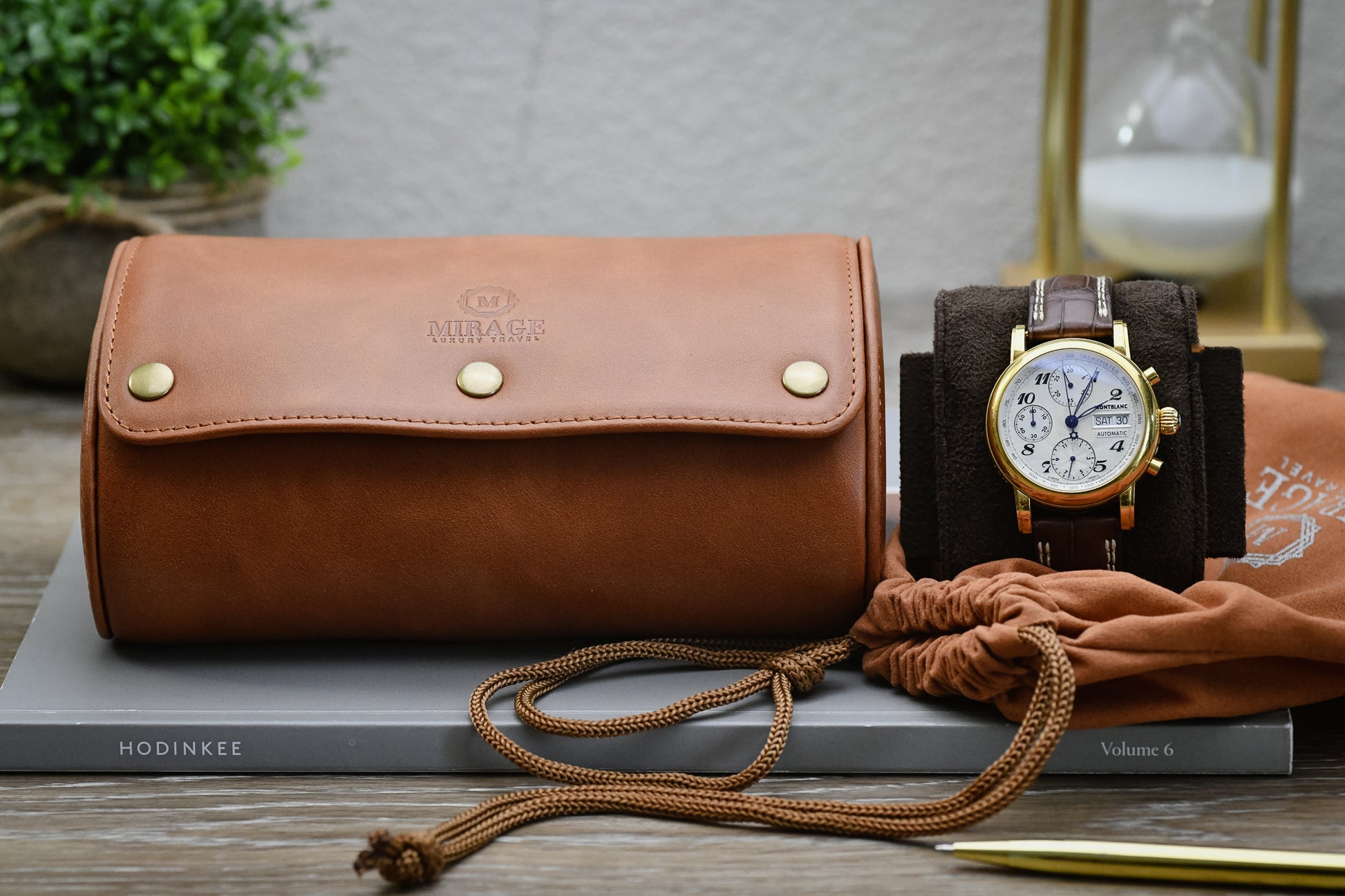 Compact Tawny Brown full-grain leather 2 watch roll ready for everyday travel and luxury watch storage.
