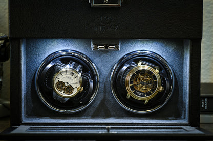 Premium suede-lined interior of the Ebony Black luxury watch winder securely winding two automatic watches.