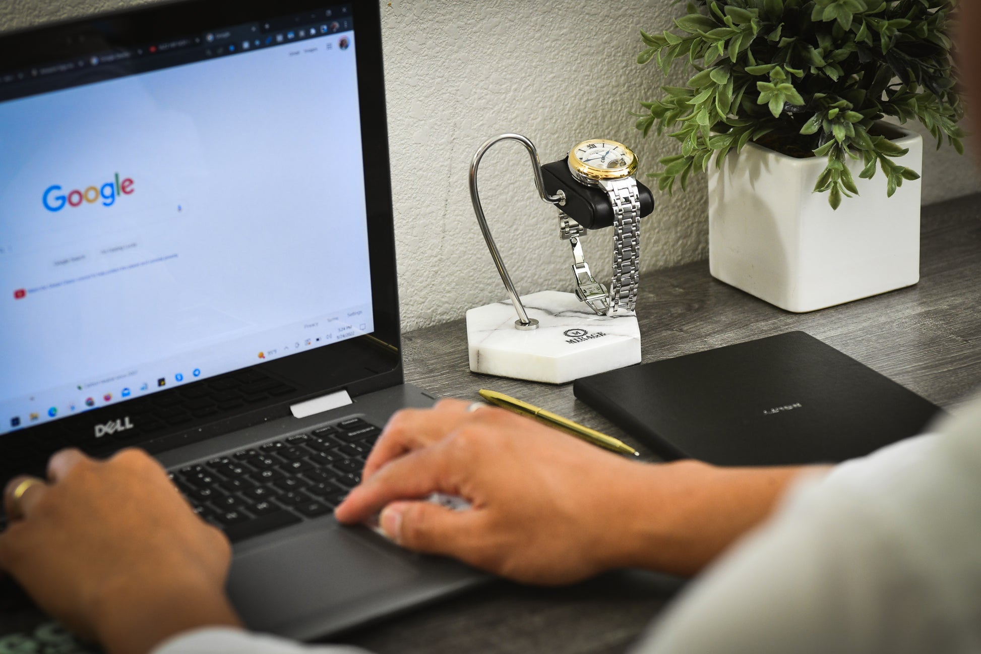 Mirage Luxury Travel White Lilac Marble watch stand displayed in an executive workspace, providing elegant watch storage for everyday use.