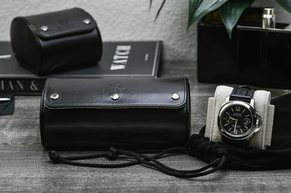 Luxury gifting presentation featuring the Jade Black vegan leather 2 watch roll with ivory white interior.