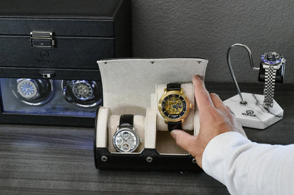 Watch collector placing luxury timepieces inside the Jade Black vegan leather 2 watch travel case.