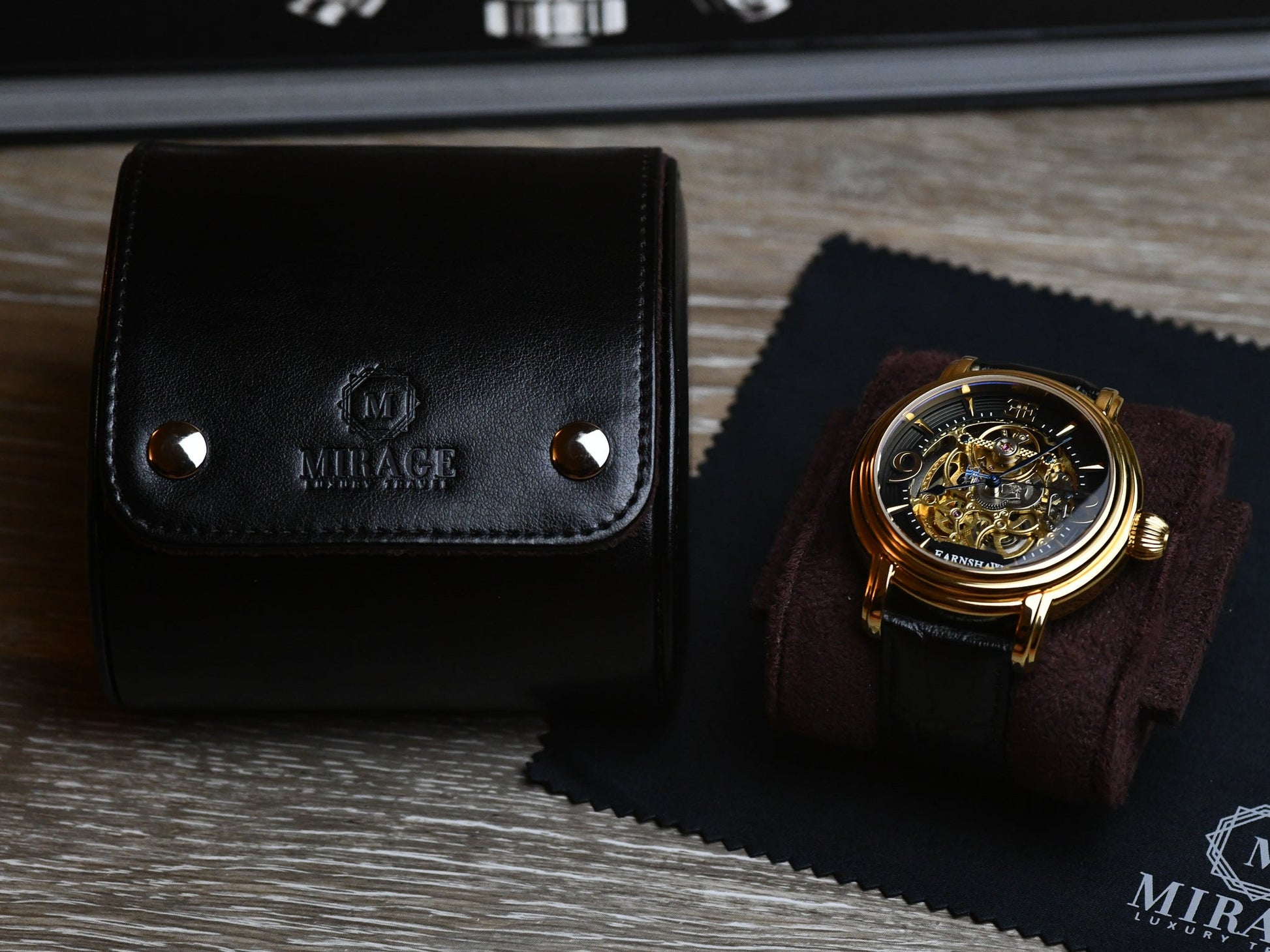 Mirage Luxury Travel Signature Collection Jade Black premium vegan leather 1-watch roll displayed alongside a luxury watch, combining elegant presentation with premium protection.
