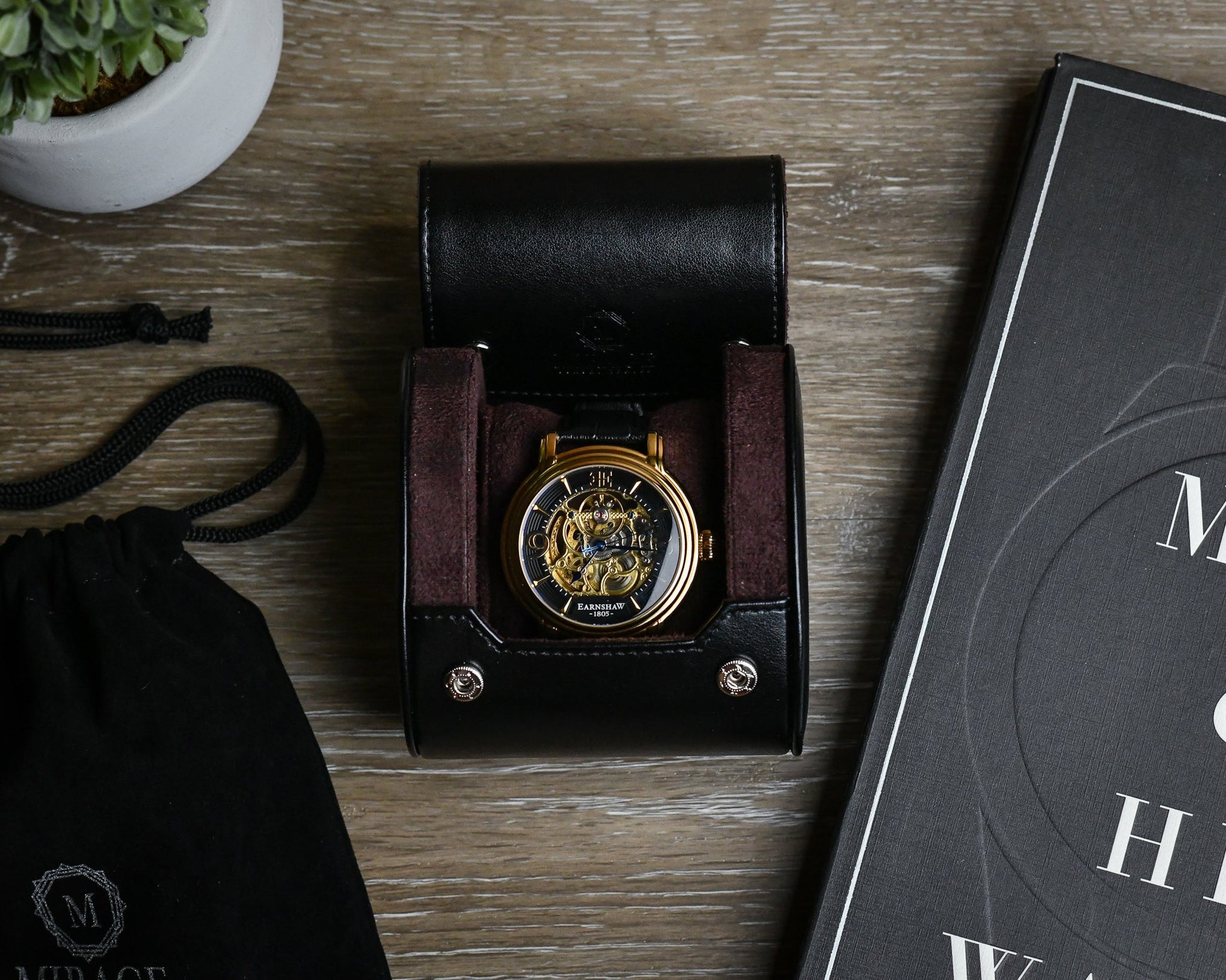 Mirage Luxury Travel Signature Collection Jade Black premium vegan leather 1-watch roll displayed with a luxury watch, highlighting elegant everyday storage and travel protection.