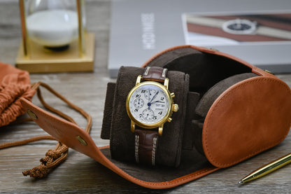 Tawny Brown full-grain cow leather 1 watch roll displayed with a luxury watch and travel accessories, showcasing elegant watch storage for collectors.