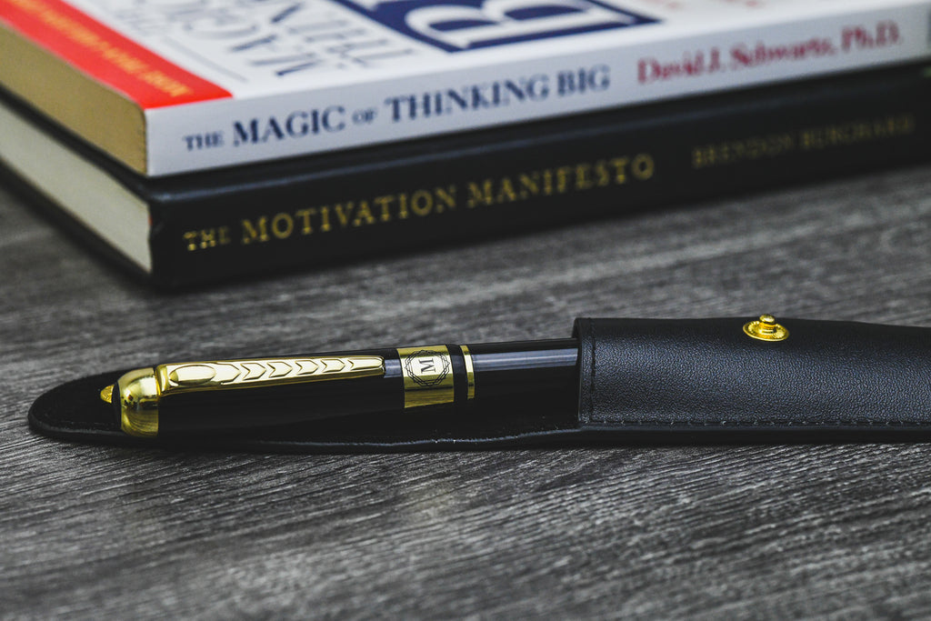 Mirage Luxury Travel Splendor Black executive pen displayed on books, highlighting premium craftsmanship and elegant writing for professionals.