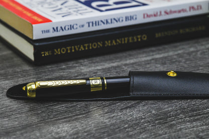Mirage Luxury Travel Splendor Black executive pen displayed on books, highlighting premium craftsmanship and elegant writing for professionals.