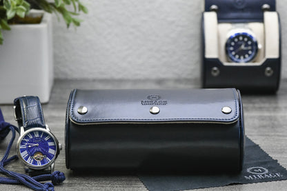 Closed Midnight Blue vegan leather 2 watch roll with ivory white interior designed for business travel and everyday watch protection.