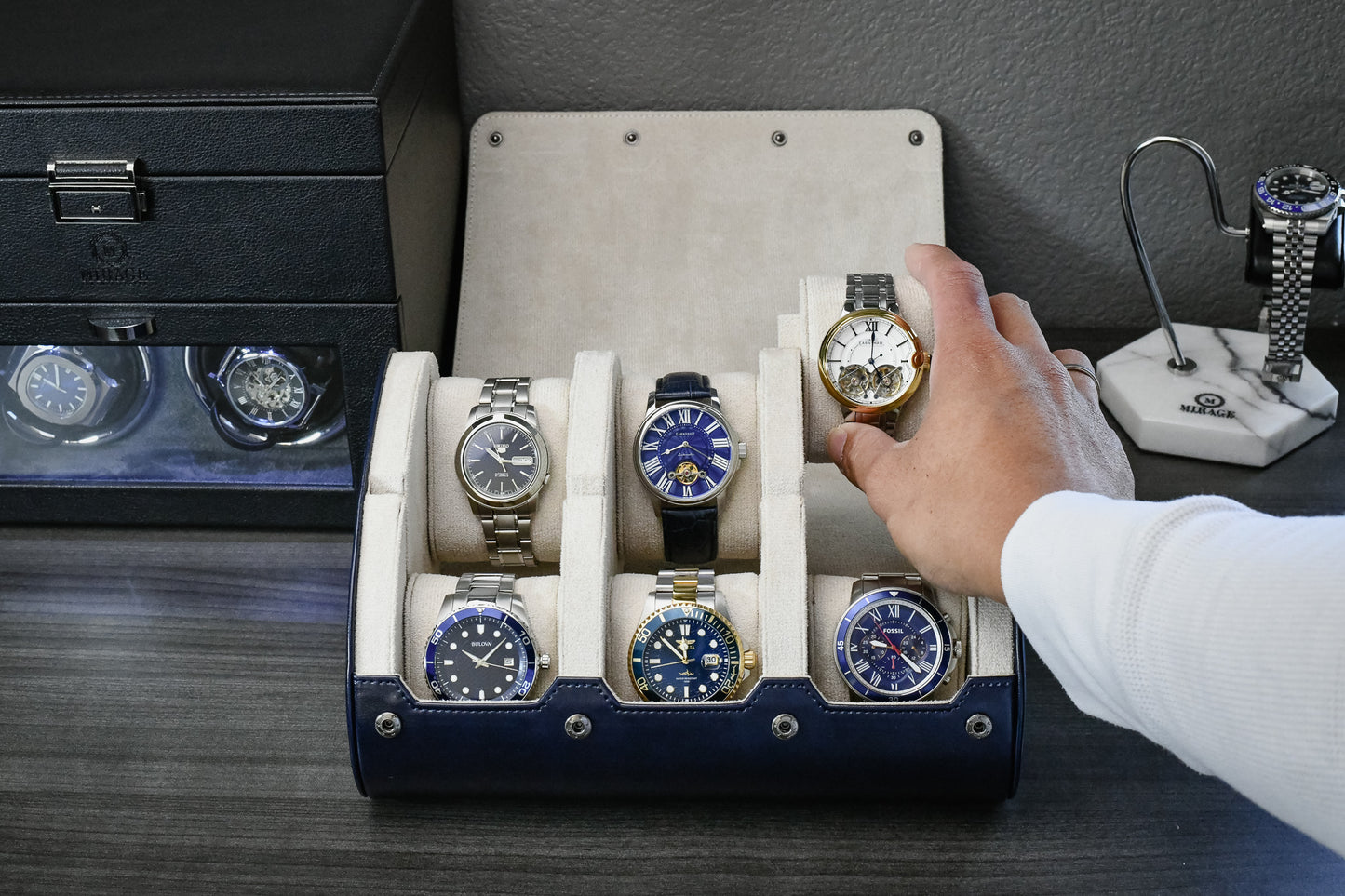 Premium Midnight Blue vegan leather 6 watch roll with ivory white interior protecting Rolex Omega Grand Seiko Tudor and Seiko watches