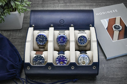 Luxury Midnight Blue and ivory white 6 watch travel case displaying six luxury watches with premium sliding cushions