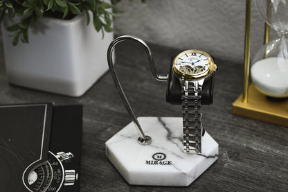 Mirage Luxury Travel Elite White Lilac Marble watch stand displayed on a desk with a luxury watch, offering elegant protection and sophisticated presentation.