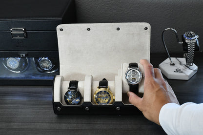 Jade Black premium vegan leather watch roll displayed with luxury accessories and collector workspace