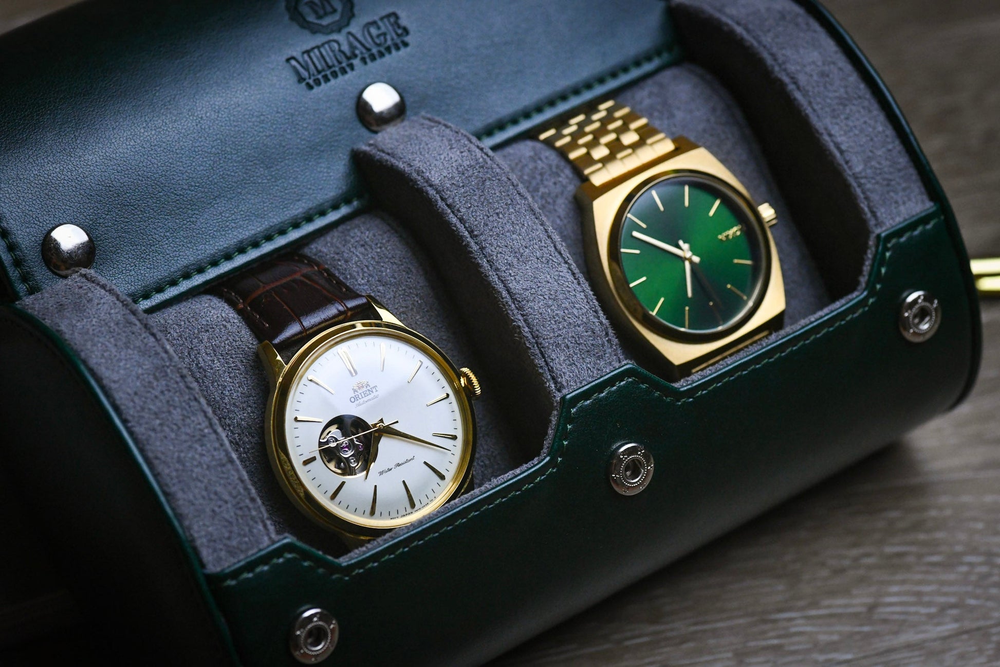 Luxury watches secured inside the Royal Green vegan leather 2 watch organizer with soft suede interior.