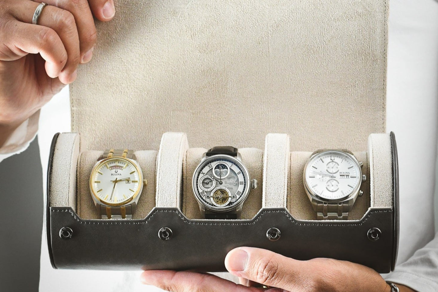 Luxury watch collection displayed inside Slate Gray and ivory white premium vegan leather watch organizer
