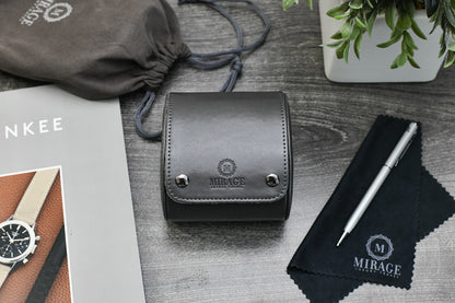 Slate Gray vegan leather watch roll displayed with Mirage Luxury Travel gift-ready packaging.