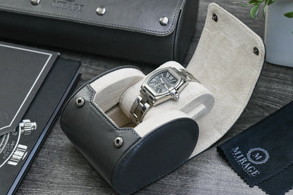 Luxury watch displayed inside the Slate Gray vegan leather watch roll with plush ivory white suede lining.