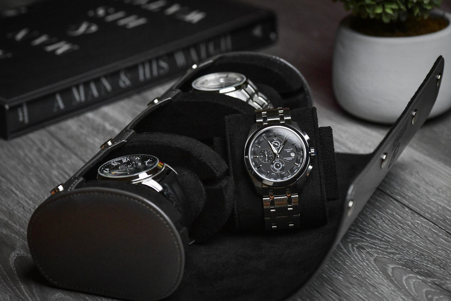 Luxury Slate Gray vegan leather watch roll protecting Rolex Omega Tudor and Grand Seiko watches while traveling