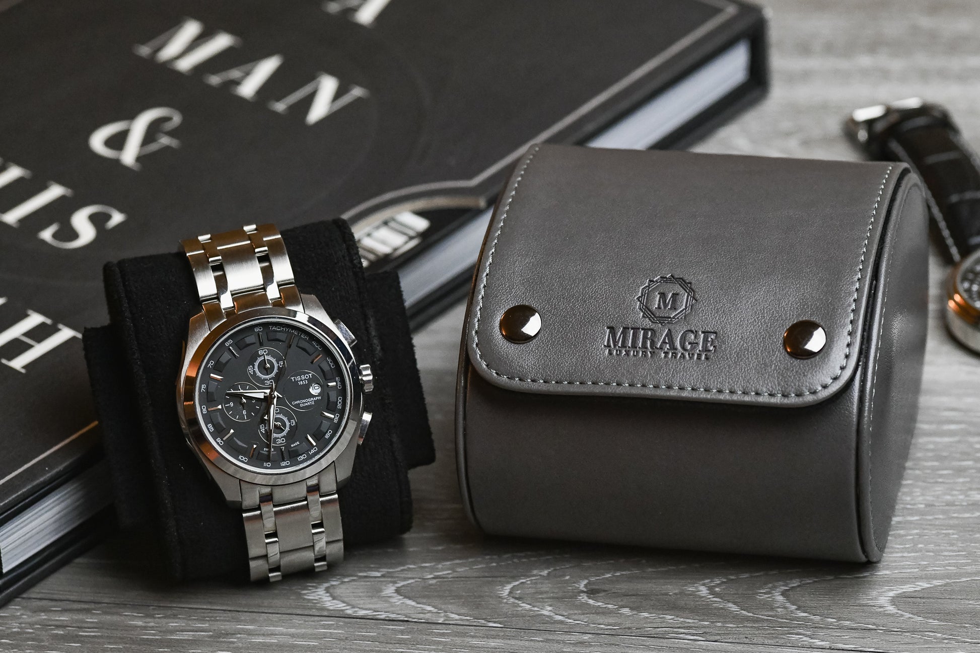 Slate Gray vegan leather single watch roll displayed with a luxury watch and premium accessories.