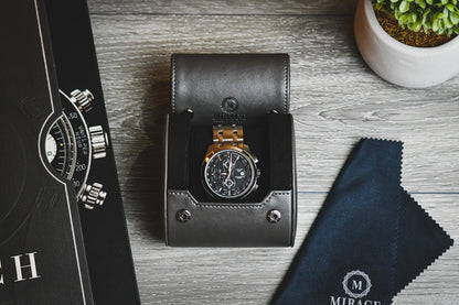 Luxury watch displayed inside the Slate Gray vegan leather watch roll with plush suede interior.