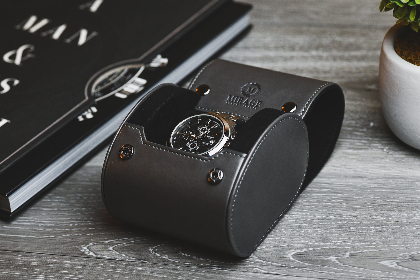 Slate Gray vegan leather watch roll displayed with a luxury timepiece for elegant home storage.