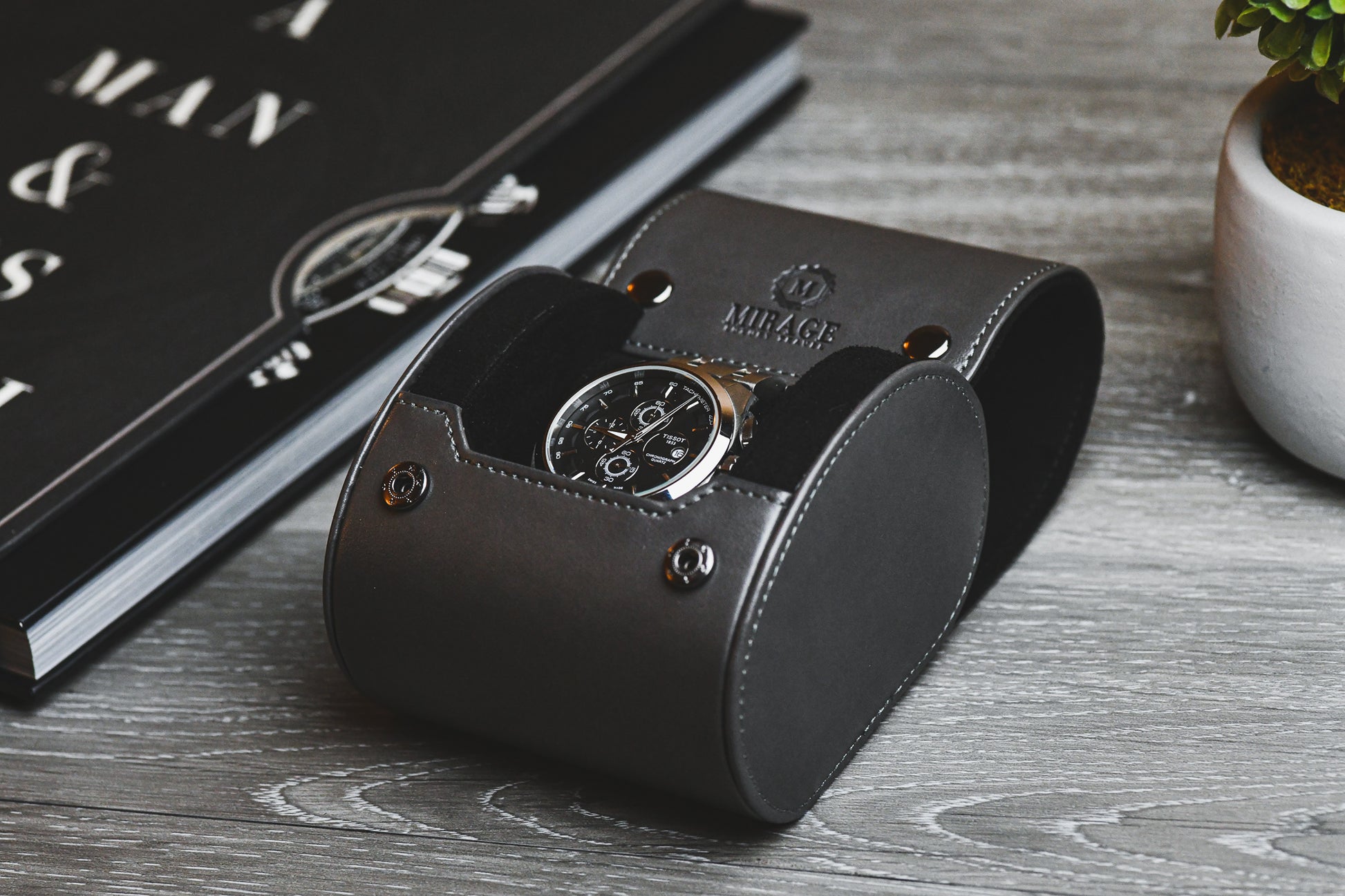 Slate Gray vegan leather watch roll displayed with a luxury timepiece for elegant home storage.