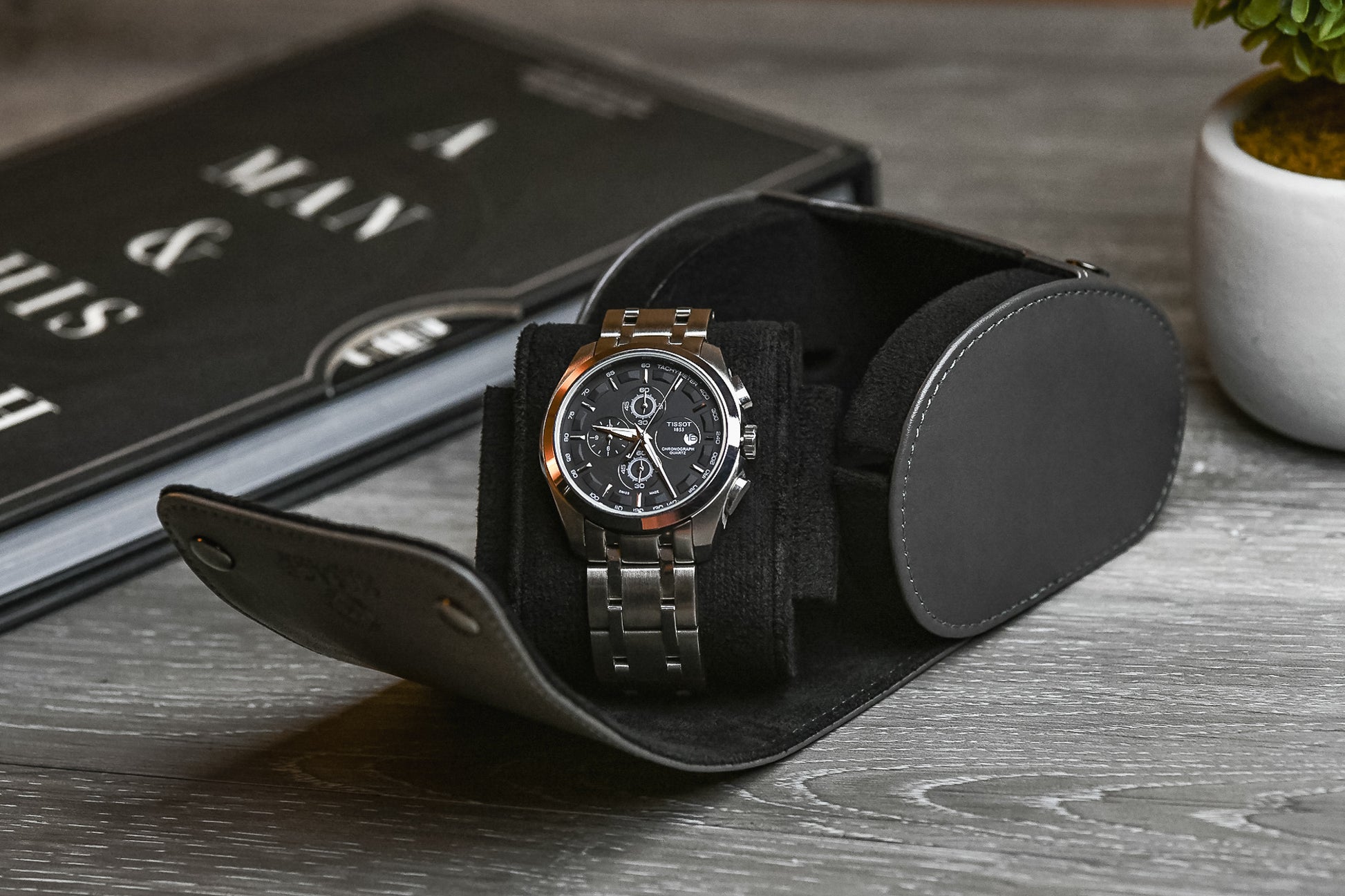 Side profile of the Slate Gray vegan leather 1 watch roll highlighting its premium craftsmanship and secure watch cushion.