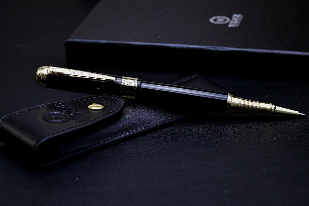 Mirage Luxury Travel Splendor Black luxury executive pen with genuine leather pen pouch, featuring a premium black stainless steel body and elegant gold-tone accents.
